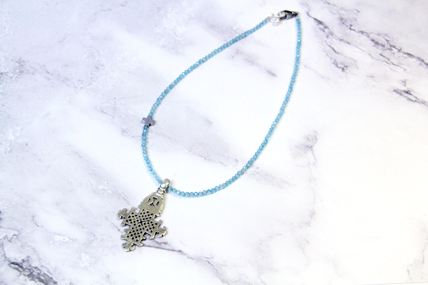 Cross Blue Topaz Necklace